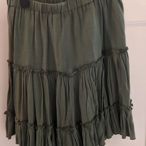 Green ruffle mini skirt